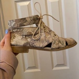 Floral cut out booties! Star shaped eyelets!
